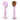 A pink skin brush with an ergonomic head and brown bristles, lying flat against a white background.