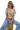 A woman sitting on a platform wearing a camel and white striped tee with a semi cropped, slightly boxy fit.