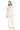 A woman wearing a cream-colored Eberjey pointelle pajama set with a v-neck henley top and matching mid-rise pants. The set features a decorative placket with corozo buttons and a lettuce edge hemline.