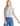 A woman wearing a cropped light grey henley tee shirt with waffle weave fabric.