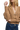 A female model wearing a beige knitted cardigan with buckle links and puff sleeves, paired with blue jeans.