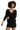 A woman wearing a black boucle long sleeve sweater and matching shorts.