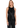 A woman wearing a black camisole with a high neck and lace trim detailing at the arms, paired with black trousers.