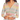 A woman wearing a multicolored striped crop cardigan with a V neckline and long sleeves.