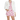 A woman wearing a white denim jacket with chain detailing and a floral pattern on the sleeves, paired with pink floral shorts.