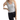 A female model wearing a pebble grey tank top with short sleeves and a V-neck design. She is also wearing black jeans.