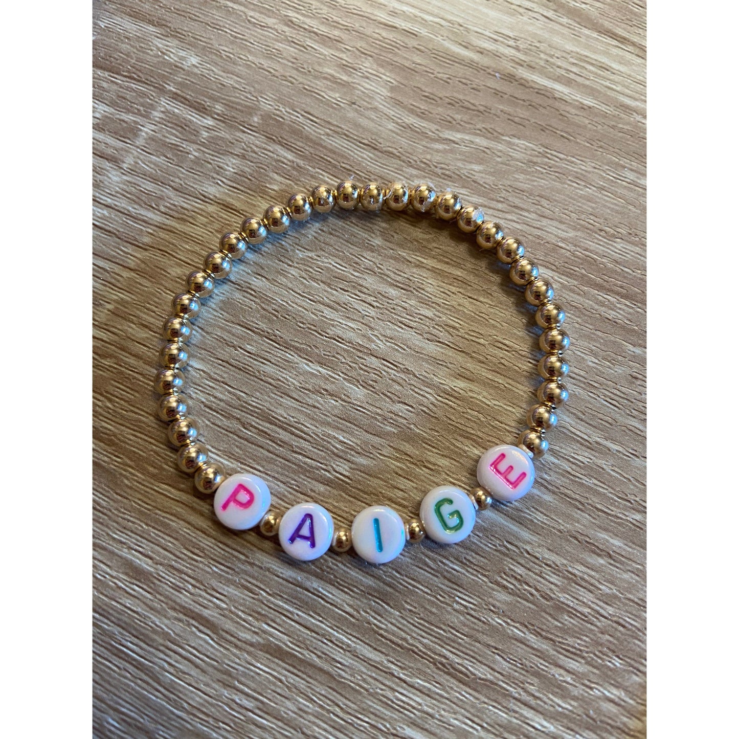 Load image into Gallery viewer, Kid’s Custom Name 4mm Yellow Gold Ball Bracelet
